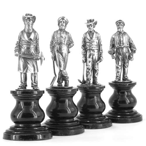 A Rare Group of Four Antique Silver Statuettes of Miners image-3