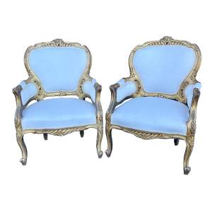 A Pair of Gilt Wood Chairs