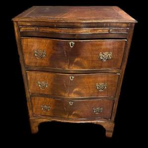 A Georgian Revival Flamed Mahogany Serpentine Chest of Drawers