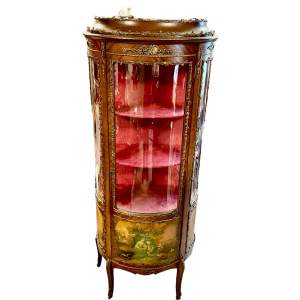 A French Serpentine Display Cabinet