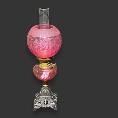 Victorian FS & Co Cranberry Glass & Cast Iron Oil Lamp image-1