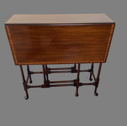 An Edwardian Inlaid Mahogany Sutherland Table. image-1