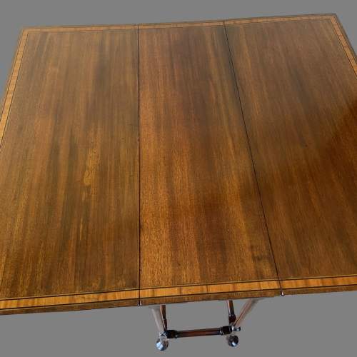 An Edwardian Inlaid Mahogany Sutherland Table. image-5