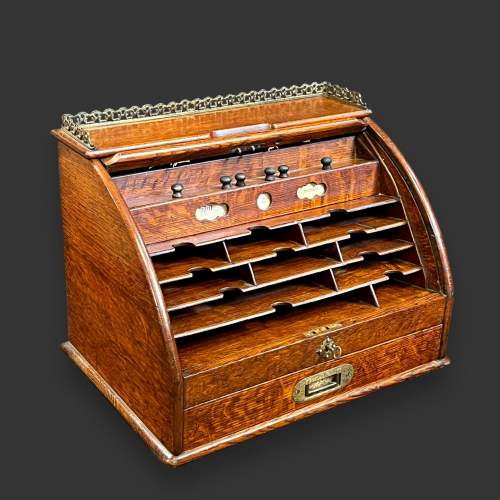 Early 20th Century Oak Tambour Top Stationery Cabinet image-1