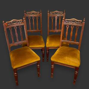 Early 20th Century Set of Four Beech and Mahogany Dining Chairs