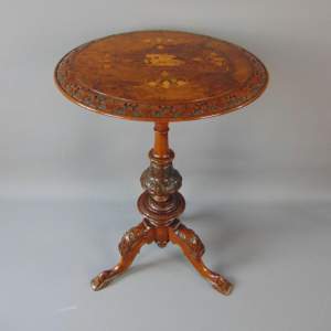 A Victorian Walnut Occasional Table
